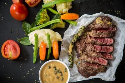 Steak frites, garlic butter melting